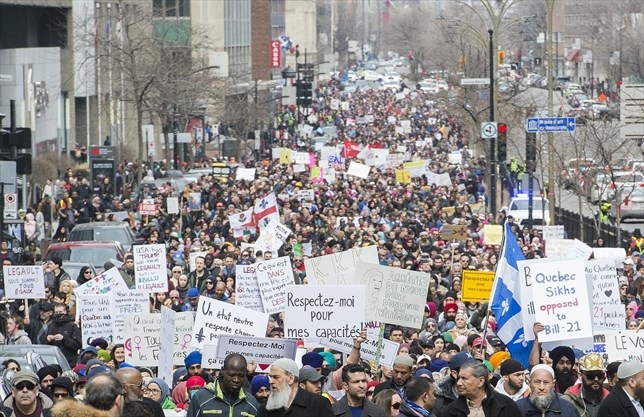 Tens of Thousands flooded the streets in downtown Montreal to say NO for the discriminating bill